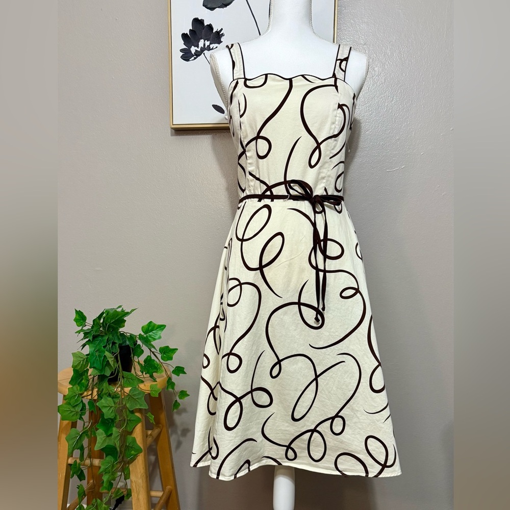 Karin Stevens Cream and Black Strapless Dress